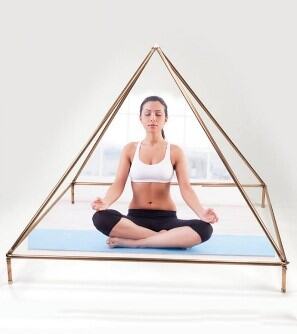 Woman Meditating under the Meditation Pyramid