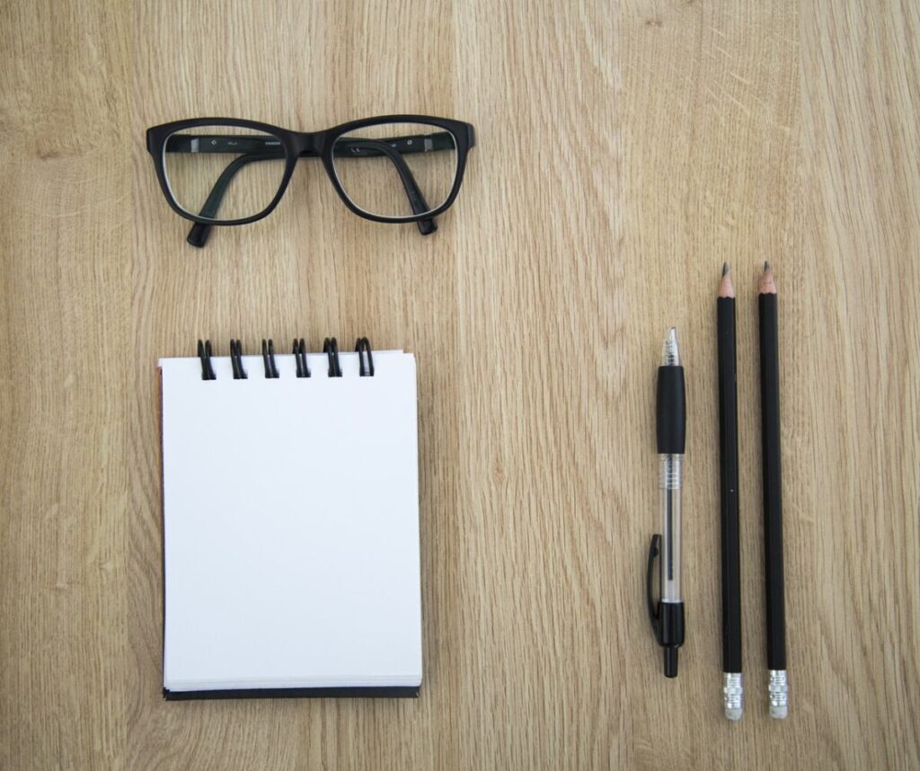 Notepad and pens representing planning