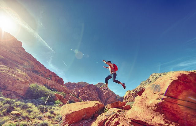 man, jumping, mountains - representing action
