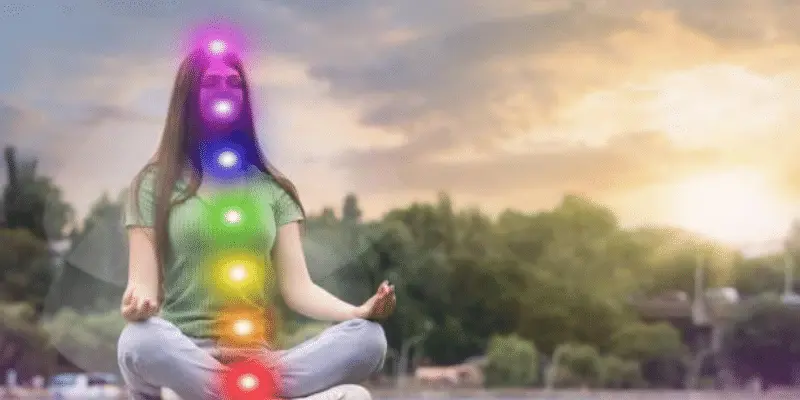 teenage girl meditating near river. scheme of seven chakras, illustration - chakra unbalance imagens e fotografias de stock